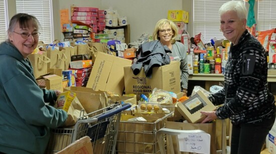 Volunteers prepare for McFarlin's Food Pantry.