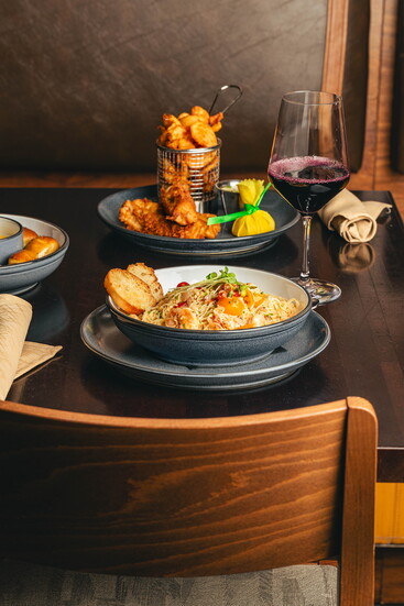 Angel Hair Pasta, Garlic, Heirloom Tomatoes, Parmesan, and Basil &  Beer-Battered Cod with Tightknit Irish Red Ale, Sidewinder Fries, and Sweet Chili Tartar 