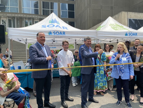 Alderman Hopkins at a Ribbon Cutting