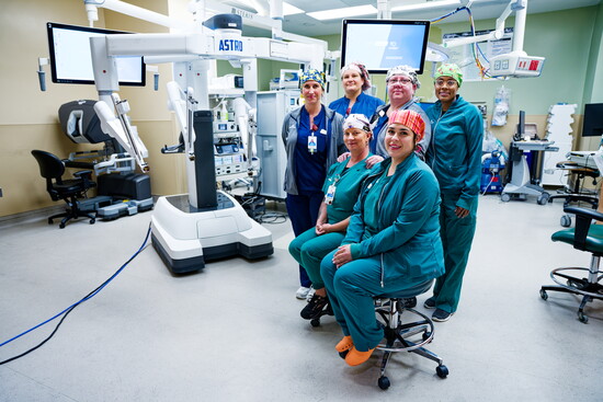 The Astro robotic system team seated (l-r) Toni Meadows, Parisa Bustamonte, and standing (l-r) Amanda Lee, Victoria Parker, Gloria Jackson, Elizabeth McCray