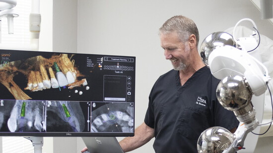 Dr. Bouma with a patient 