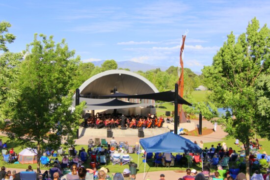 Meridian Symphony Orchestra performing a free outdoor concert in Kleiner Park celebrating Gene Kleiner Day and the philanthropy that made the park possible.    