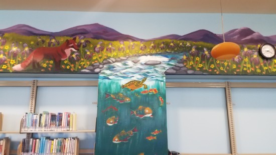 This mural in progress is in the children's department at the main branch.