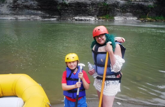 Lisa Bloss and her son, Liam, whitewater rafting