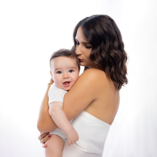 Talia and her 5 month old son. Photo taken at Kossina Creative Photography