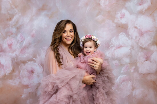 Rebecca and her daughter during her first birthday photoshoot at the Kossina Creative Photo Studio