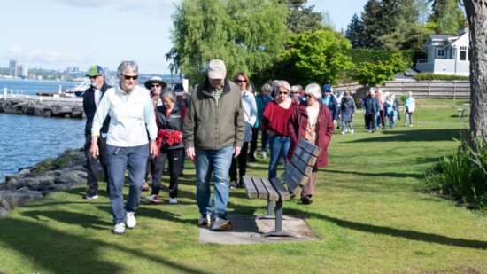 Solemates founder Fran Call (L) leading the group on a lakeside walk