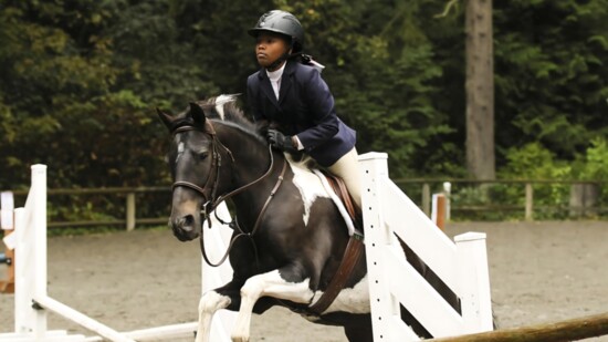 Gabby and Bria jumping in the early days