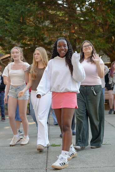 Seniors Joy Rurangwa and Pilar Bousono along with cast members.