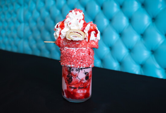 Mustang Sally: strawberry Cheerios rim, strawberry milkshake, strawberry shortcake ice cream bar, strawberry Swiss Roll, topped with whip.
