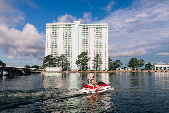 A Lake Conroe backdrop, waterfront tower, and open water access make it easy to trade routine for recreation within minutes of home.