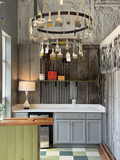 A chandelier created with paintbrushes