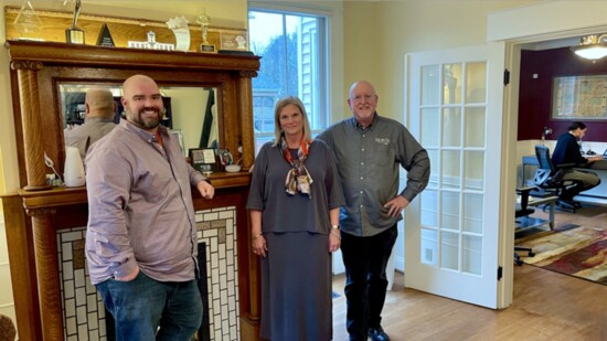 Ian Murray, Kerry Murray + Mike Murray in the original part of the 1859 house that hosts their family business, SpotOn Productions.