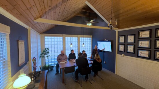 A mid-20th century addition to the back of the house is now a Conference Room with vaulted ceilings and natural light.