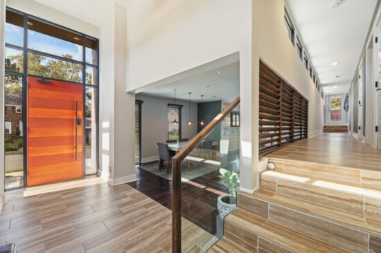 Two  story modern Foyer filled with natural light.  