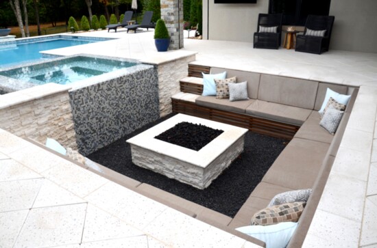 The sunken firepit holds a firm attraction on cool evenings.