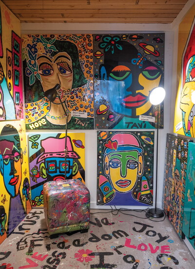 TAVi's gallery features rooms filled with bold portraits and abstract faces in his signature style of acrylics, puffy paints and high gloss epoxy finishes.