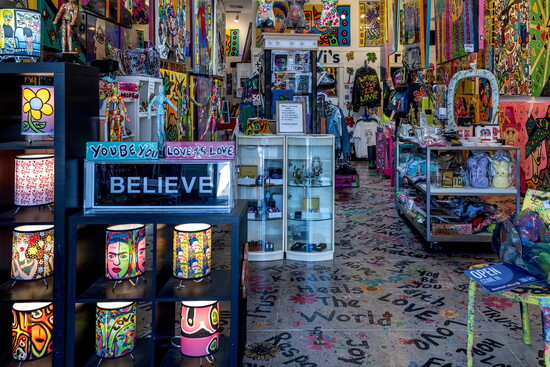 TAVi's gallery is a colorful immersion experience where art covers every surface, from walls to floor.