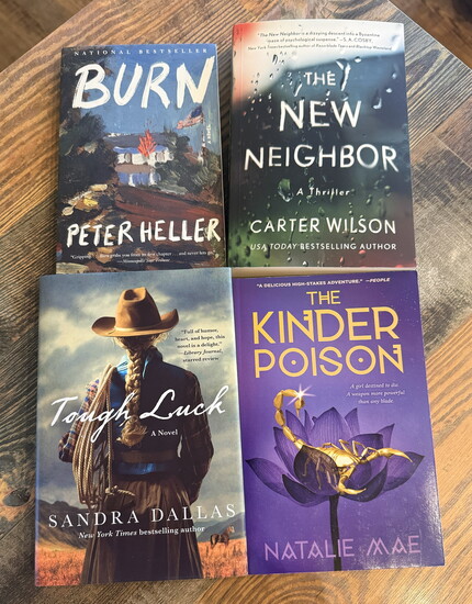 A small sampling of great Colorado reads - featuring Peter Heller, Sandra Dallas, Carter Wilson, and Natalie Mae - now on the shelves at Words of Windsor.