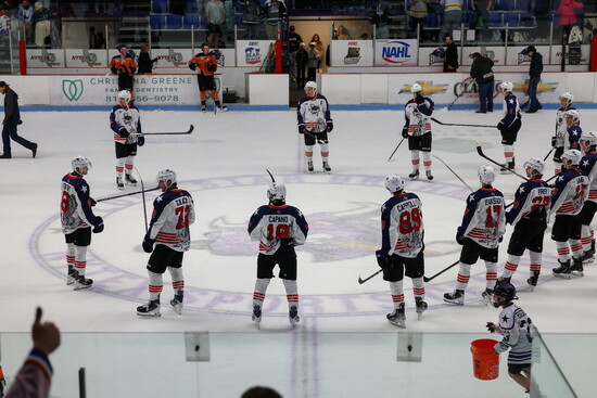 The Lone Star Brahmas gather on ice to thank their fans following the game.