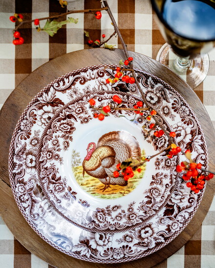 Use your silver and china, Pitts stresses, even if you decide to use modern elements as well. Plates are Spode Woodland Turkey.