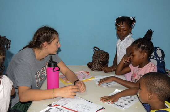 Harper Lisk mentoring local children through personalized tutoring.