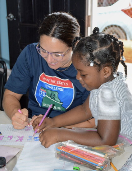 Head Soccer Coach Alean Balistreri, tutoring a student.