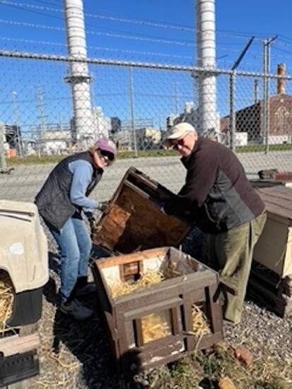 Volunteers Joyce and Deme winterizing feral cat shelters