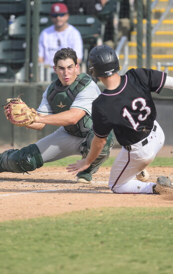 Jonathan Mauro defends the plate.