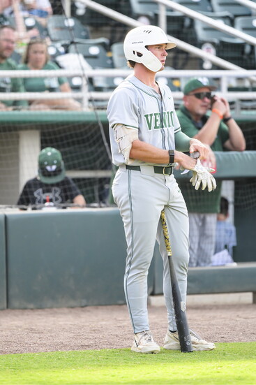 Carter Cox waits on deck.