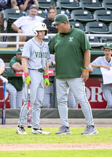 Head Coach Craig Faulkner advises August Backman.