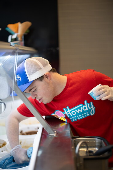 Ben Levine scooping ice cream