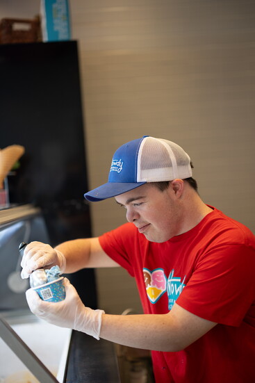 Ben Levine scooping ice cream