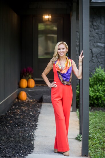 Real estate professional Alex Egan stands outside the Chamblee home where she used focal walls to design the interior space.