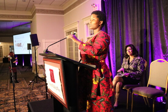 Mentee Manirombona Ernestine speaking at W3 Gala