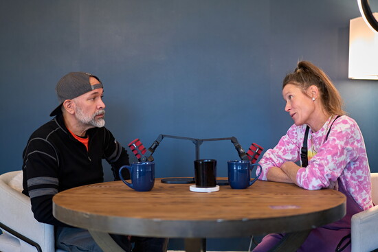 Sergio and Heather in their podcast studio. 