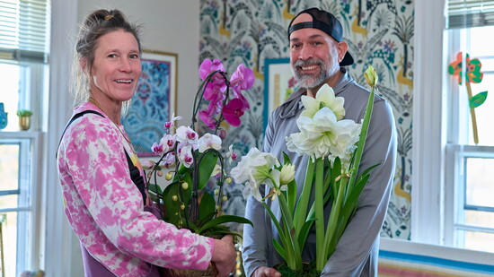 Heather Walsh, (L) and Sergio Sanmiguel, inside their West Hartford 