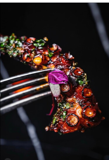 Barbouzard's grilled octopus with spicy putanesca sauce, preserve lemon, picholine olive, teardrop pepper
