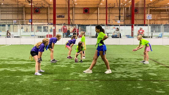 Kids learn the fundamentals of passing, catching, and teamwork in a fast-paced, non-contact environment that builds confidence on every play.