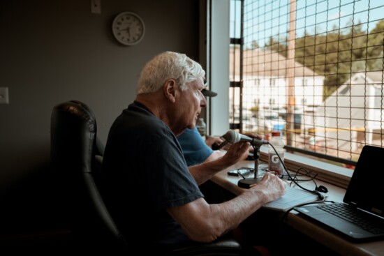 Don Longtin in the Broadcast booth at Little League