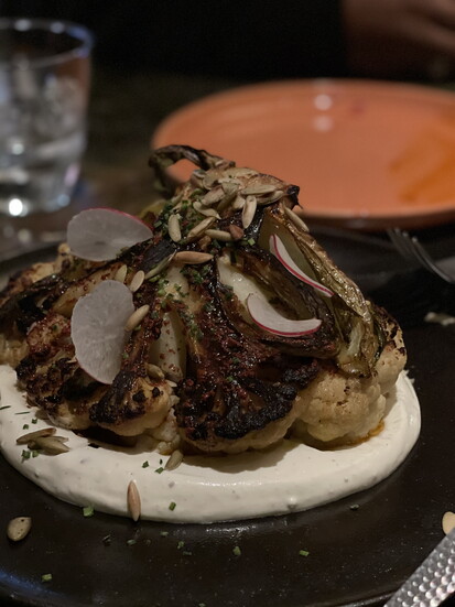 Roasted cauliflower with pepitas, shaved radish, and Yucatán-inspired dressing.