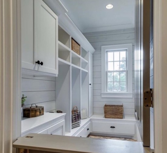 A custom built mudroom from Gregg Homebuilding with a Dutch door! Photo from: @frontporchlivinglife 