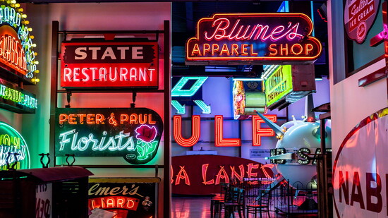 Neon hallway at the American Sign Museum. Photo by: Natalie Grilli