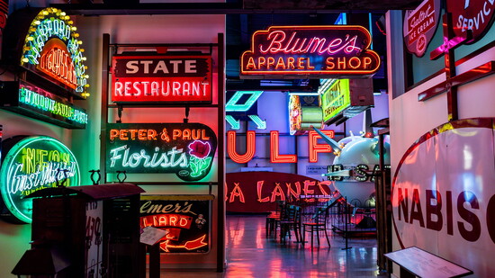 Neon hallway at the American Sign Museum. Photo by Natalie Grilli.