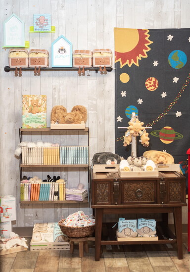 Soft, whimsical Jellycat plushies add a playful touch for children and the young at heart.