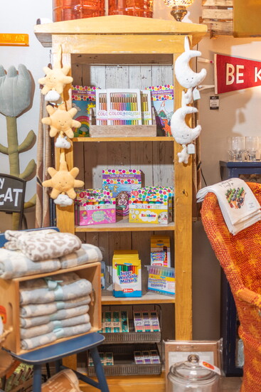 Soft, whimsical Jellycat plushies add a playful touch for children and the young at heart.