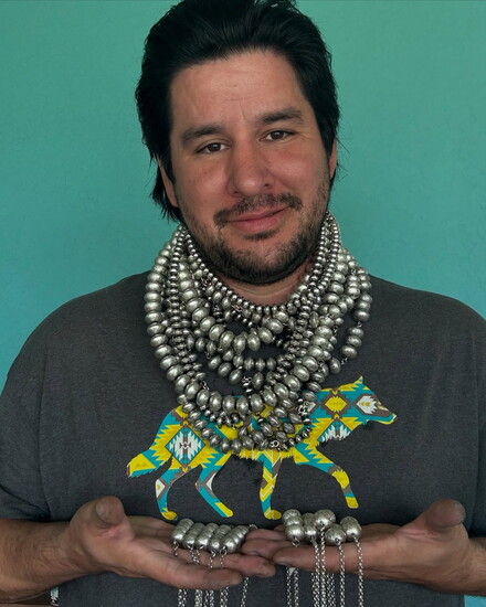 Jason Ogg, Ponca, draws inspiration from his heritage. and culture. He's become well known for his unique "Ponca Pearls," and beautiful charms.