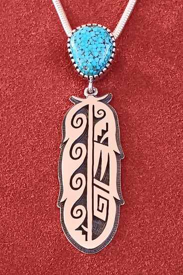 Ramon Dalangyawma, Hopi, uses laser-like precision in cutting out his designs and meticulous background stamping brings forth a beautiful creation.