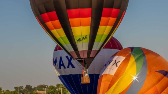 Hot Air Balloons being inflated and launched.