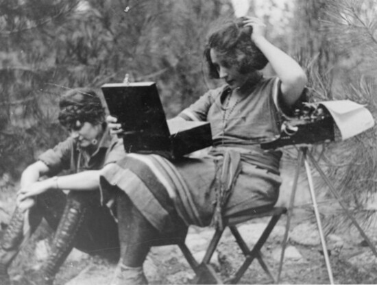 Nell with makeup kit, typewriter, and script girl